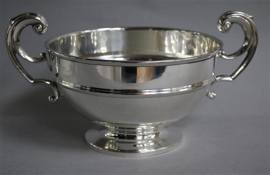 A silver two-handled pedestal bowl, London 1912, maker Robert Pringle, 12.23 oz.